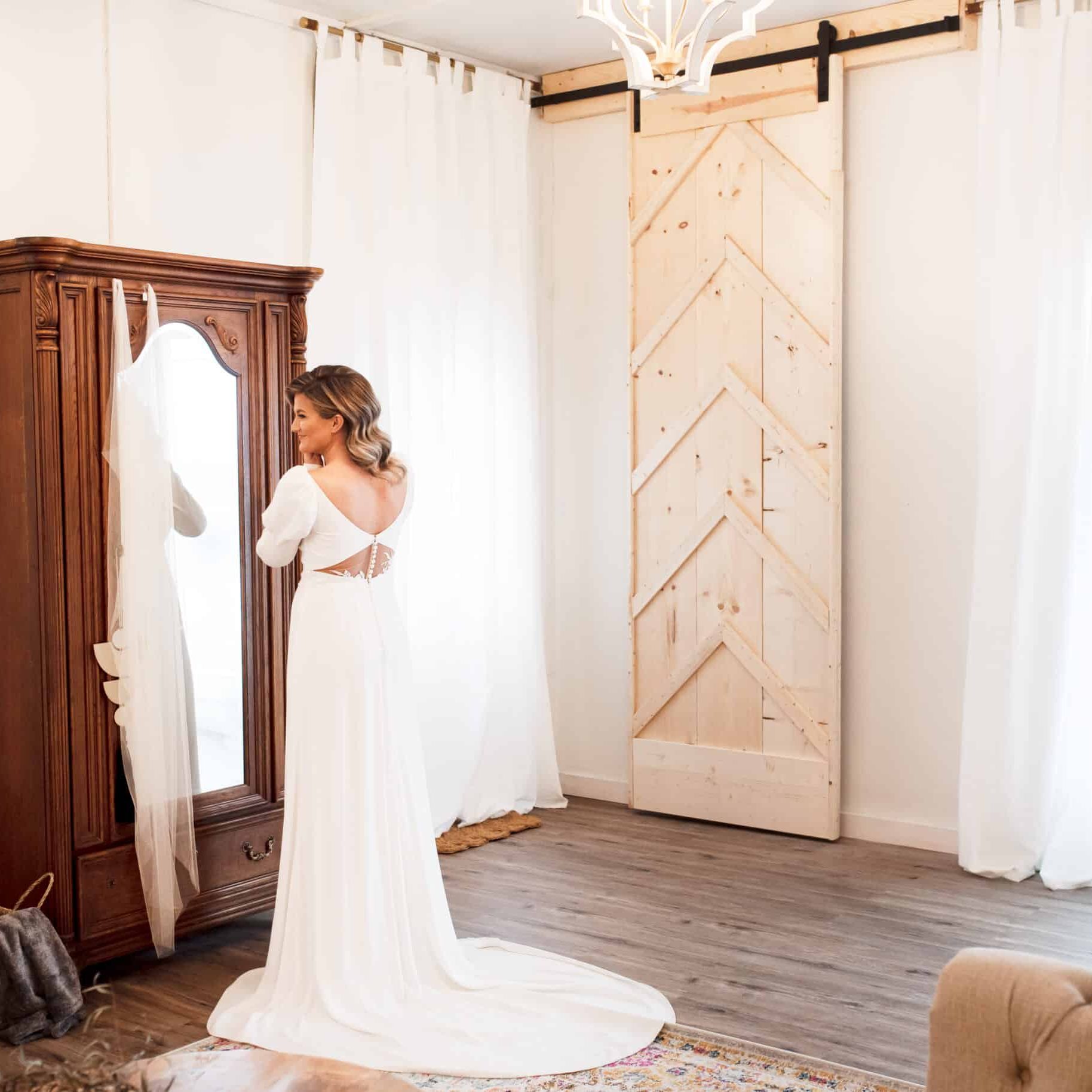 Bride getting ready in the bridal suite
